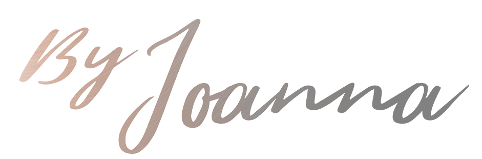A close-up of a handwritten name 'Noam' on a brownish surface.
